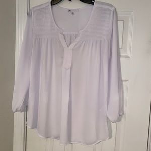 Flowy white blouse with detail